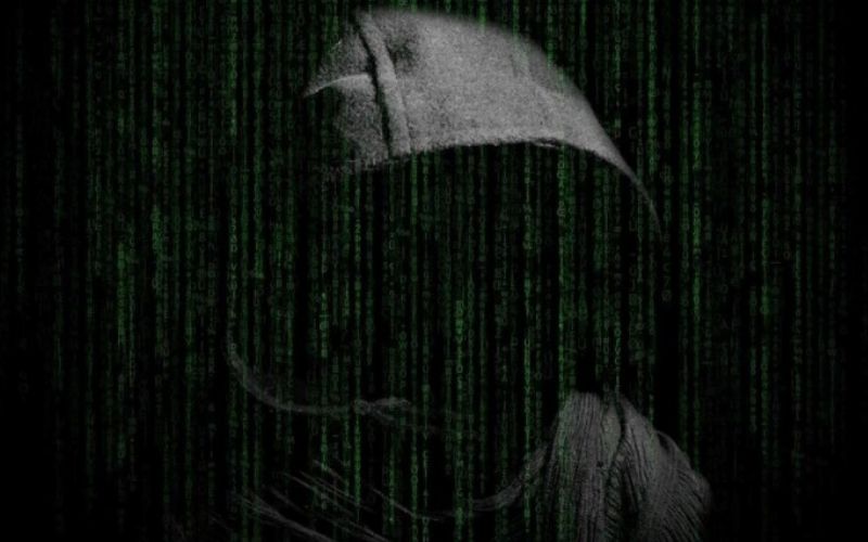 Hacker with binary code
